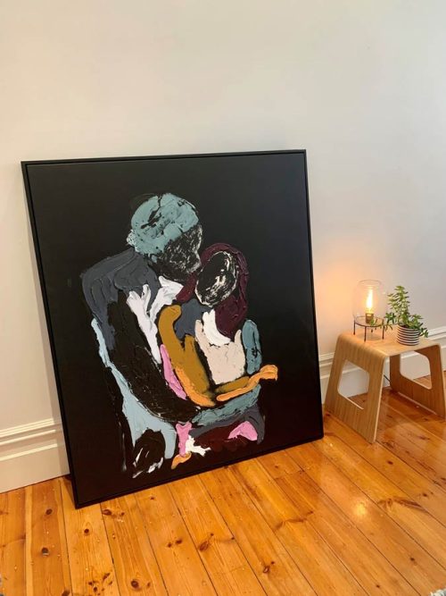 man loving woman painting colourful black canvas - body bloom iii